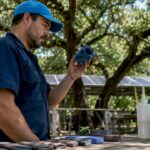 Technician inspecting 3D print finishing tools