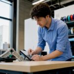 Engineer examining 3D printed prototype