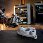 Engineer scanning a printed replacement part