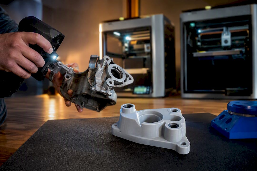 Engineer scanning a printed replacement part