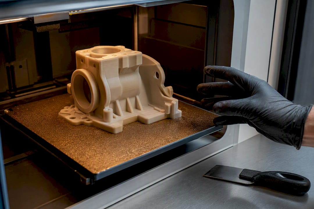 Printed part cooling on heated build plate