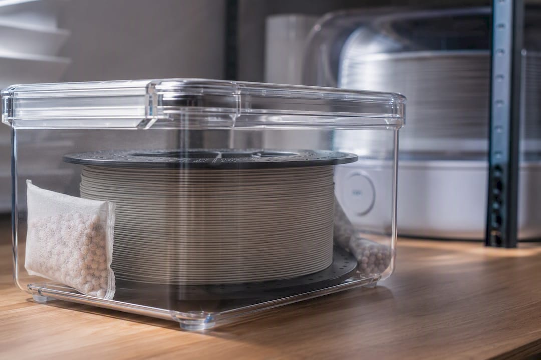 Nylon filament stored with desiccant