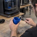 Calipers measuring a food-contact FDM print