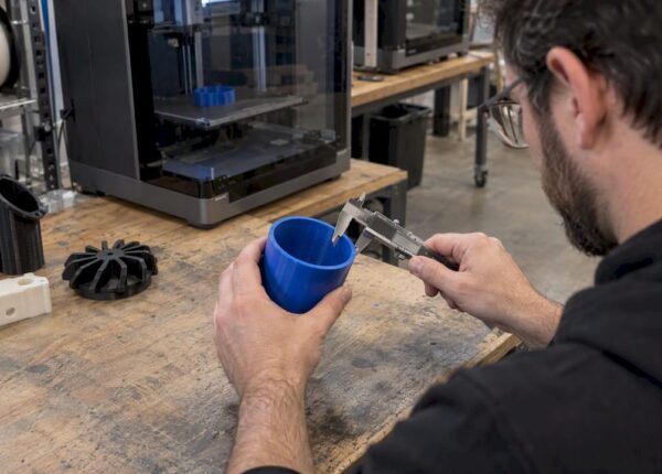 Calipers measuring a food-contact FDM print