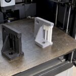 FDM brackets printed with contrasting supports